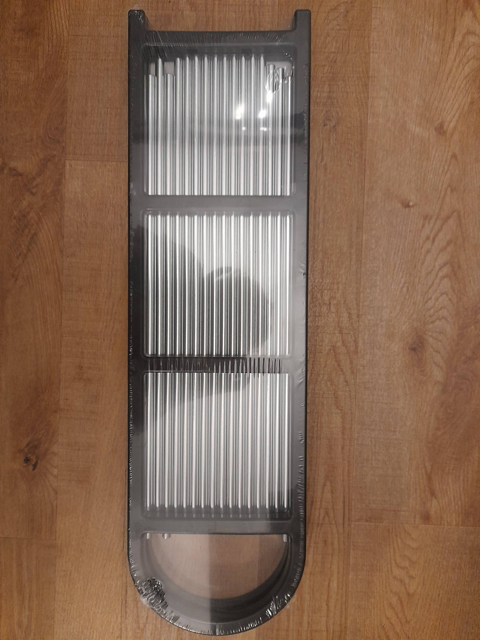 4 Tier Shoe Rack Colour will vary (between grey or black).